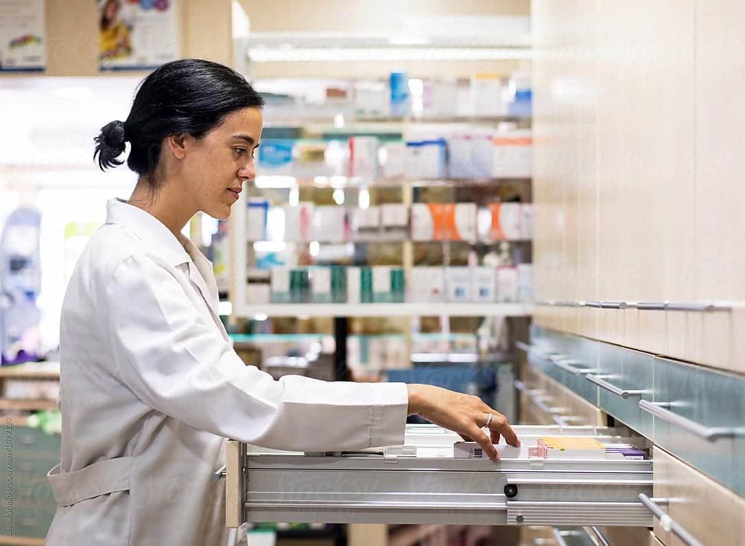 Pharmacist filling prescription